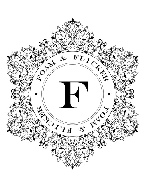 Foam and Flicker emblem, capital F in the center with the words Foam & Flicker stated twice in a circle around the F, nestled in a filigree creating six points like a snowflake 